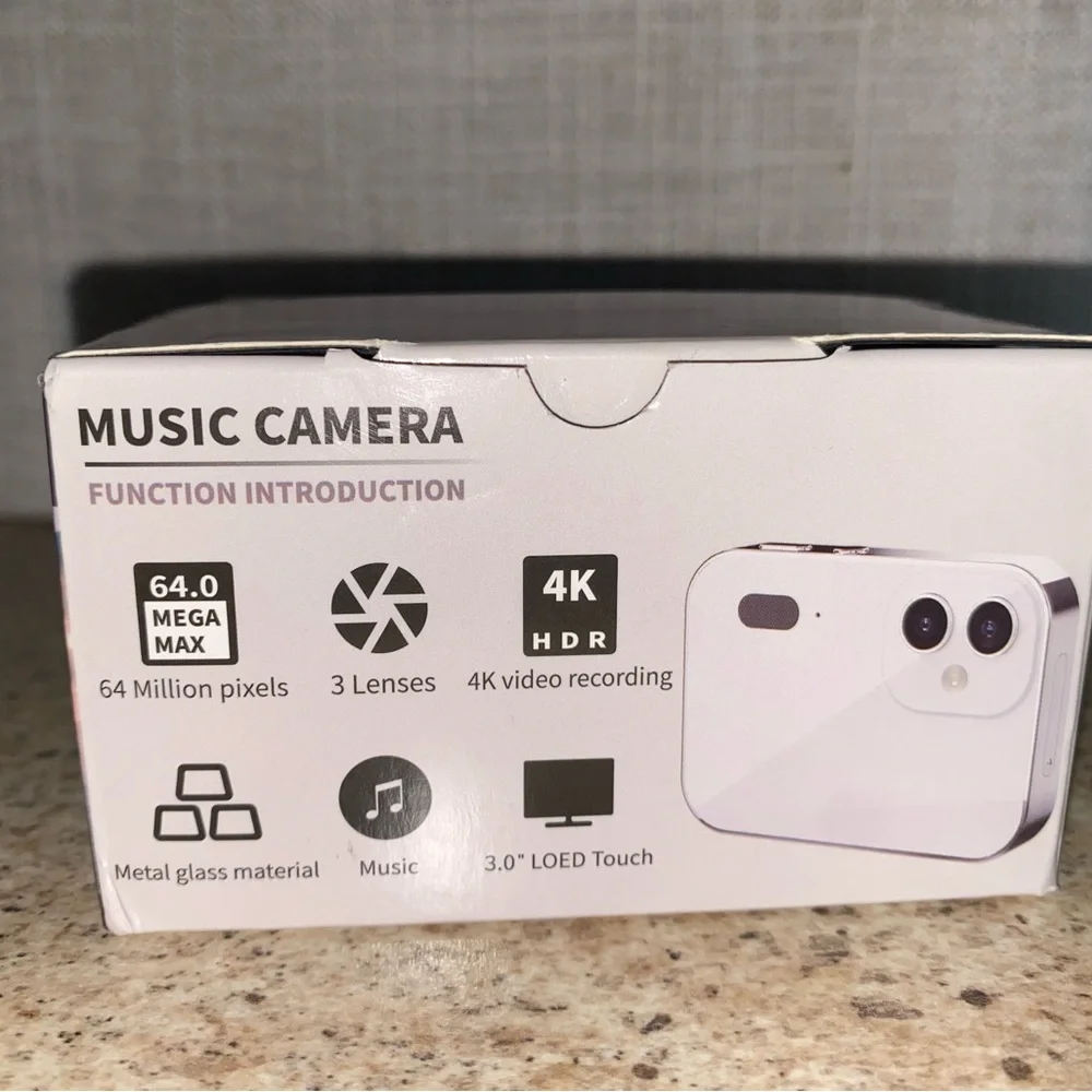 White and Black Touchscreen Music Camera